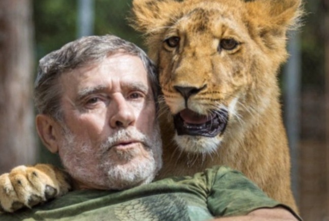 Alexander Volovik with a lion cub